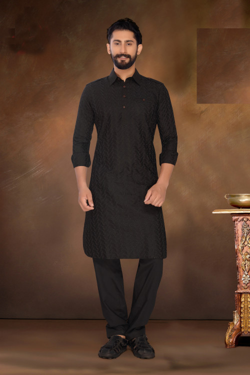 This black pathani sherwani has embroidered work done on it which is made from cotton poly fabric. http://bit.ly/2UQihRW