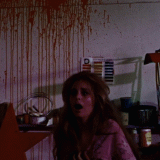 Messiah-of-Evil-1973-GIF-01-15-37-scared-woman-red-splattered-wall