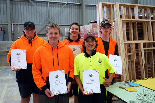 Our-Certificate-II-Construction-Pathways-students-proudly-holding-their-certificates.jpg