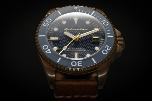 The Spinnaker Tesei Bronze Edition watch is a bronze diver that is the first offering from Spinnaker that is hand-assembled in Switzerland The Spinnaker Tesei Bronze Edition case is solidly done in bronze, a metal that ages and patinas itself in ways unique to the wearer The case of the Tesei Bronze Edition is 43mm wide and 16mm thick, with an exhibition case back.