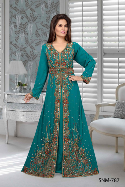 This stitched Islamic Kaftan is a teal color which has embroidery work done on it. I t is made from Faux Georgette fabric. http://bit.ly/2PCVCF4